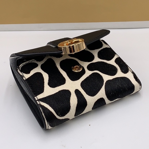 MICHAEL KORS
Carmen Medium Flap Bifold Faux Fur-Leather Wallet
BLACK COLOR - Picture 7 of 12